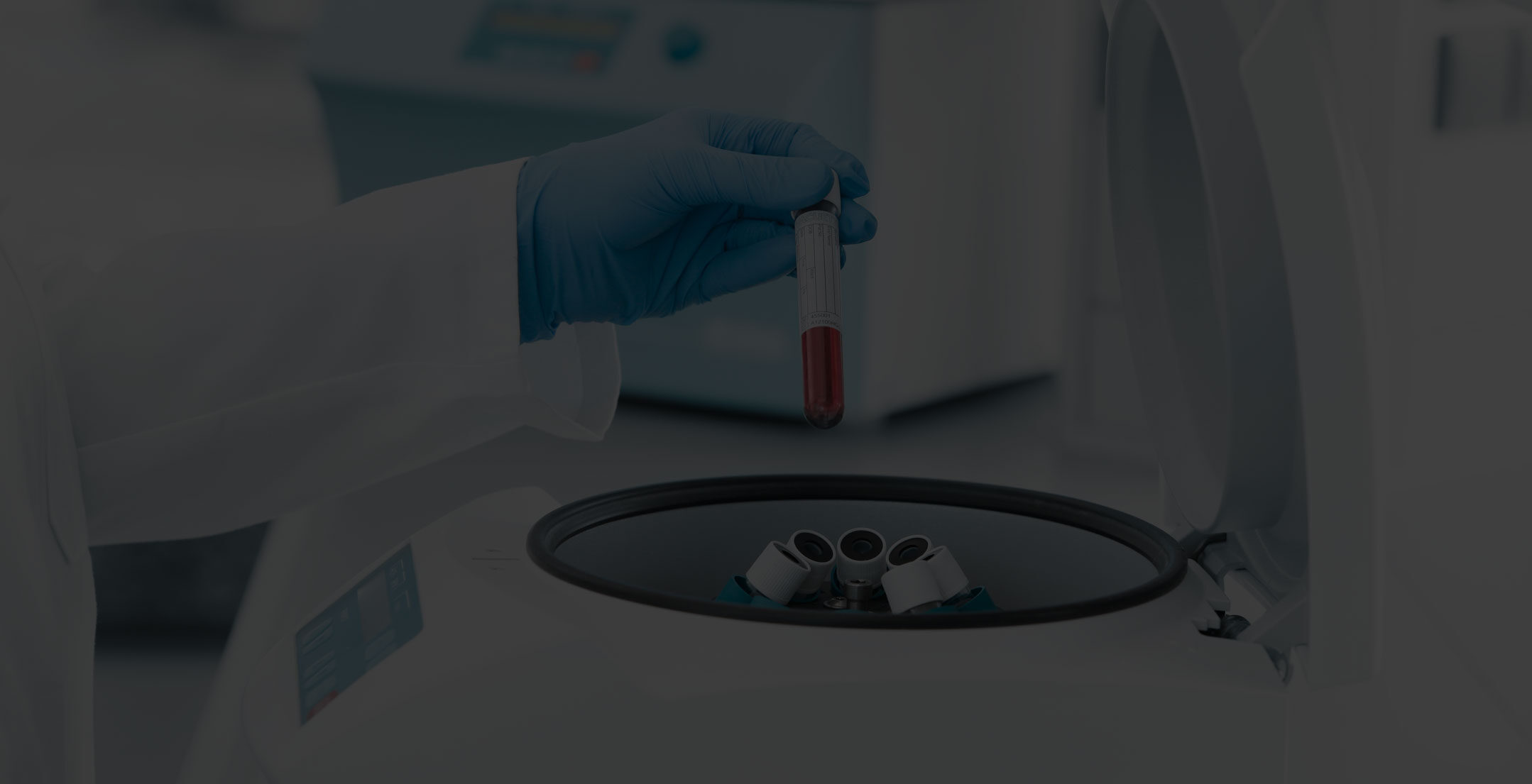 loading blood tube into Hettich small centrifuge